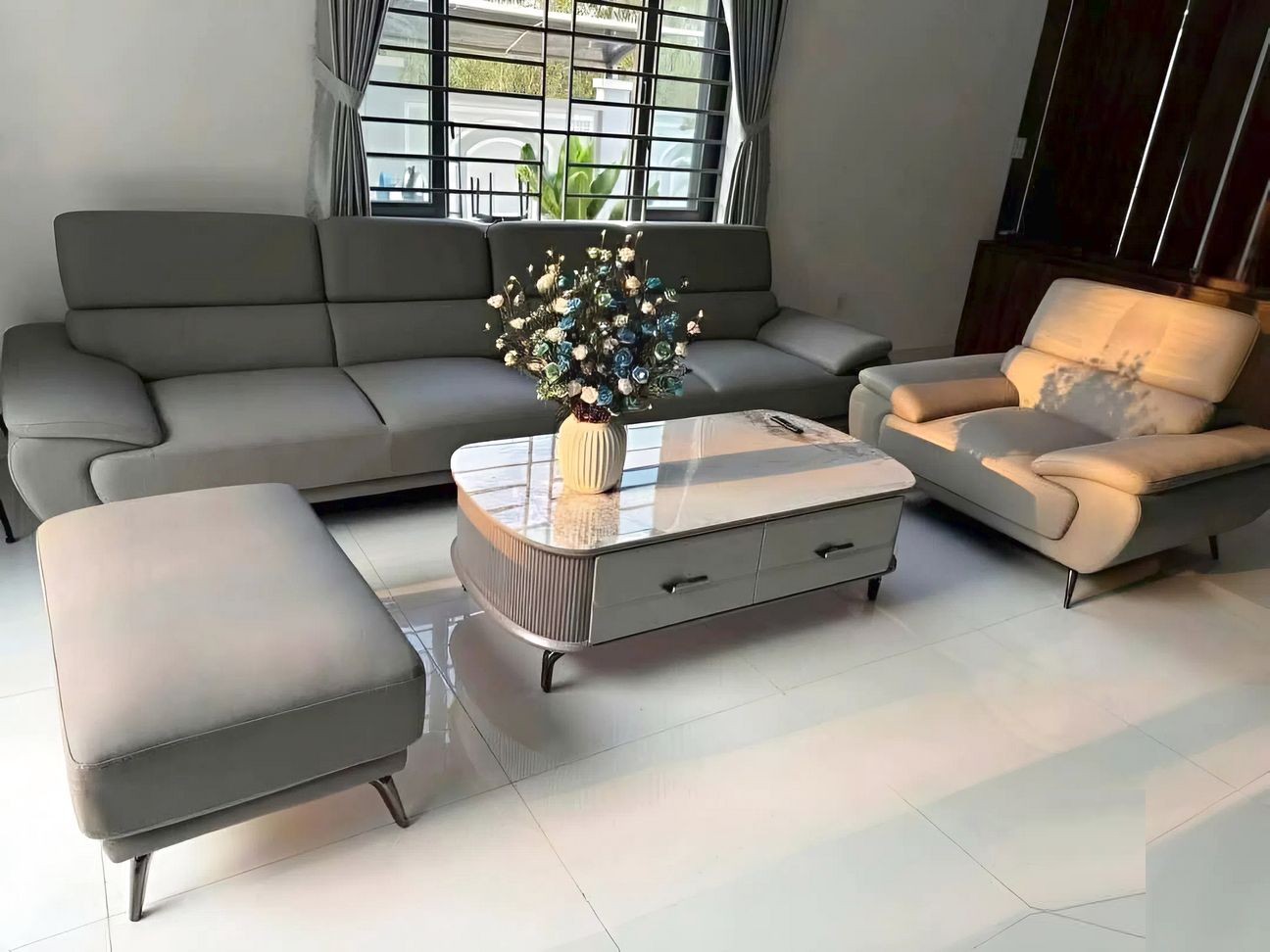 Bộ Sofa da chống bút bi, chống xước 2 ghế 1 đôn to SF10